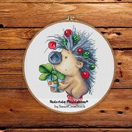 Hedgehog with a gift cross stitch pattern
