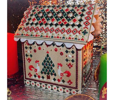 Gingerbread house made with embroidered details